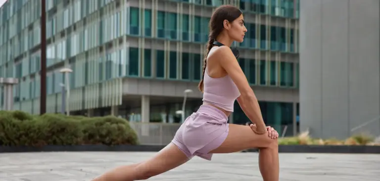 woman-exercises-fitness-mat-stretches-legs-being-good-physical-shape-h